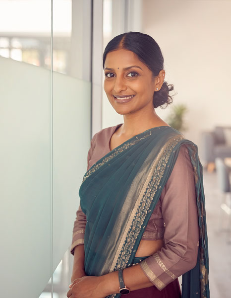 Firefly -A confident Indian woman entrepreneur wearing an elegant traditional outfit (such as a sare (1)